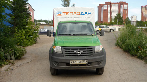 Для УАЗа торговой компании "Теплодар" изготовлен тент с рекламой.